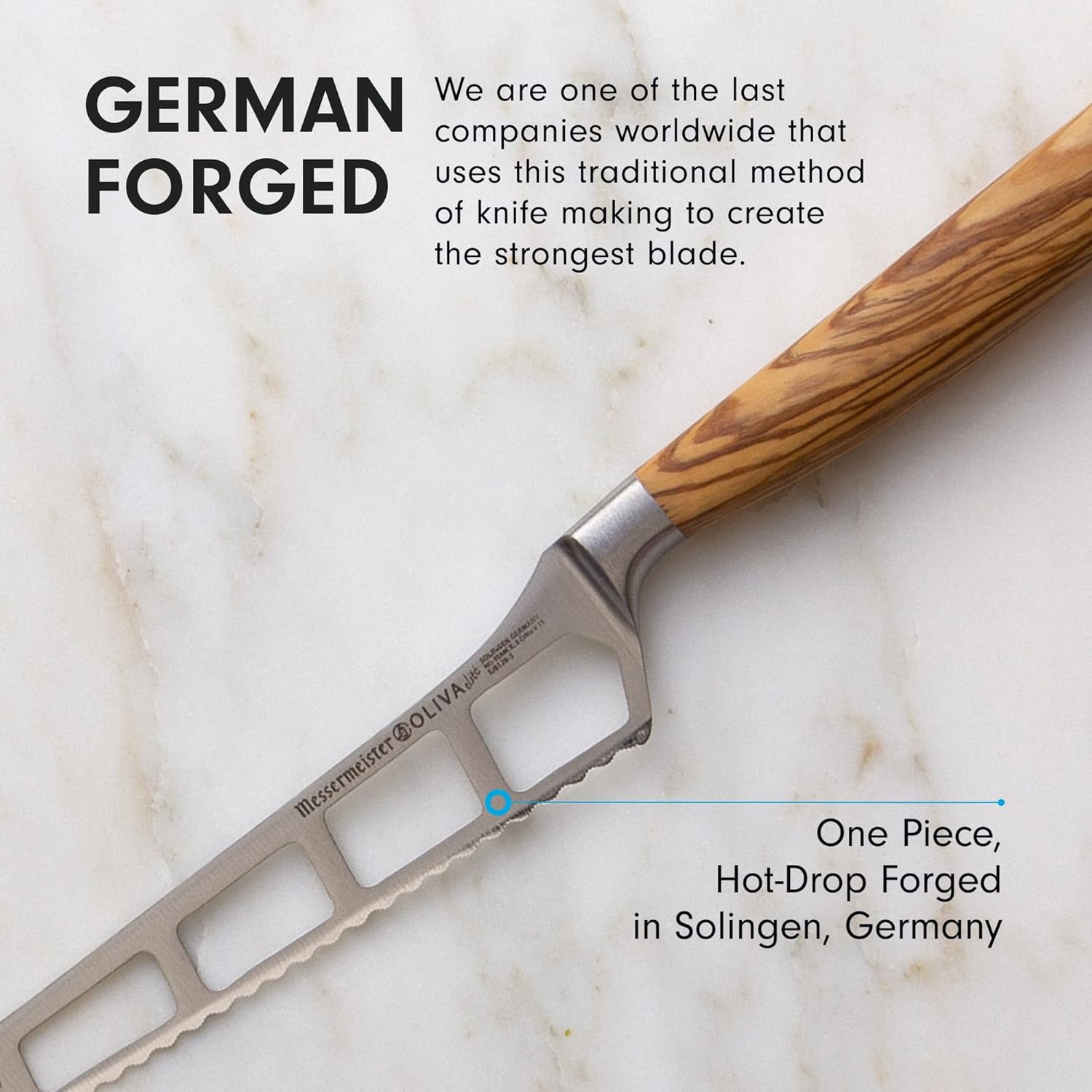 Knife with wooden handle on a marble background, highlighting German forging process.