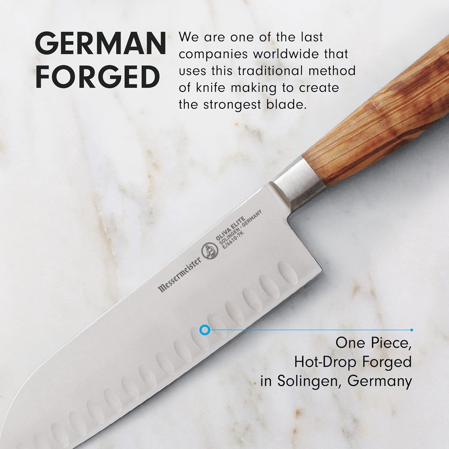 Knife with wooden handle on a marble surface, highlighting German forging process.