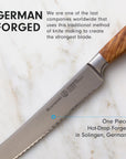 Knife with wooden handle on a marble background, highlighting German forging process.