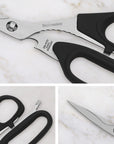 Pair of scissors with black handles on a marble surface, featuring the brand 'Messermeister'.