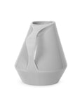 Side view of gray ceramic pitcher on a white background