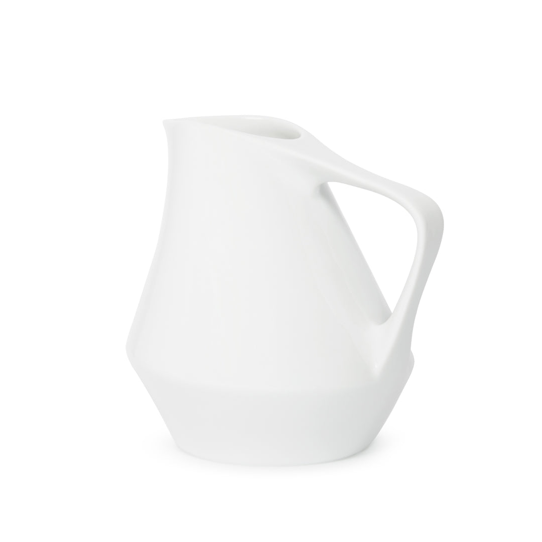 White ceramic pitcher on a white background