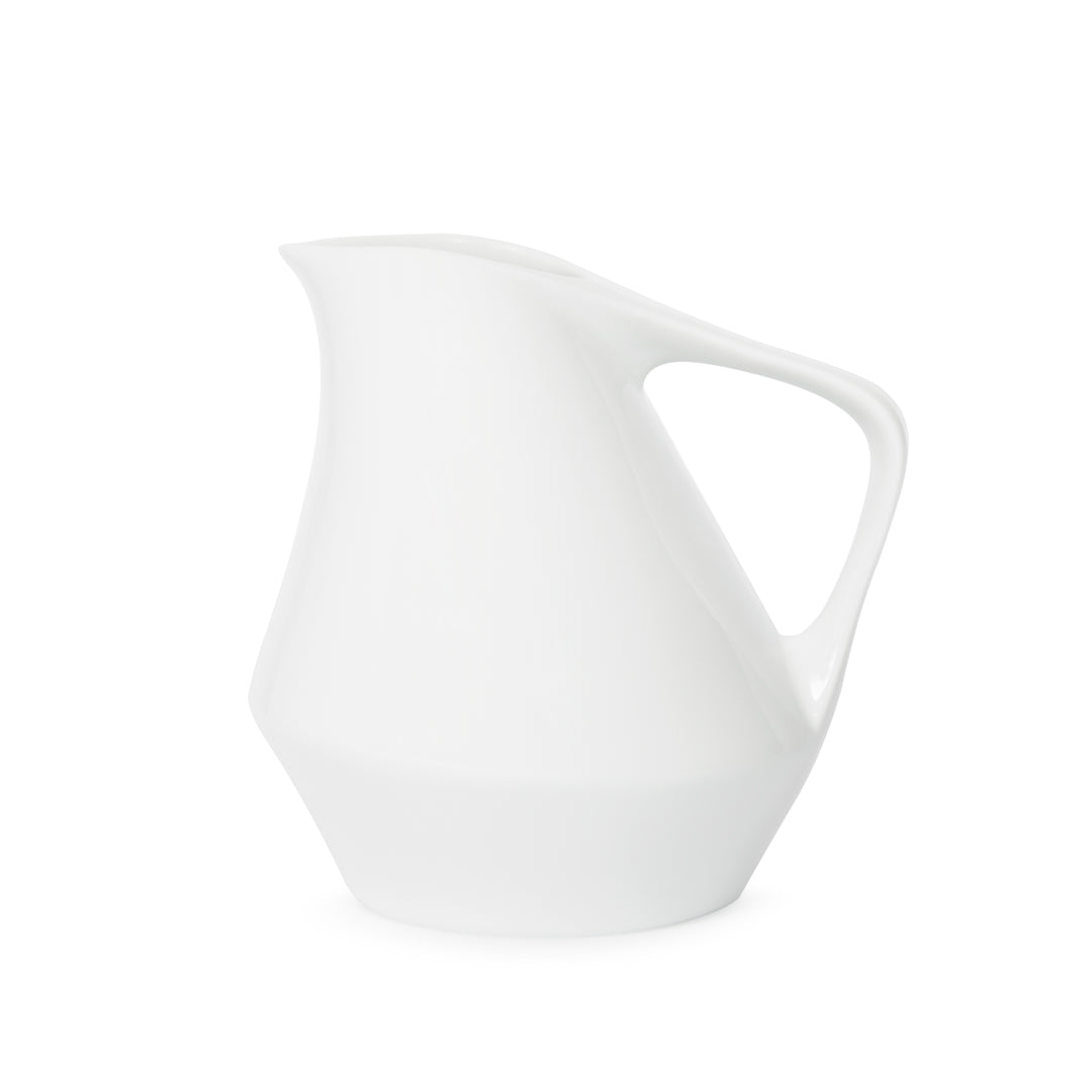 Front view of white ceramic pitcher on a white background