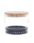Medium airscape glass container with airtight lid and bamboo lid on a white background