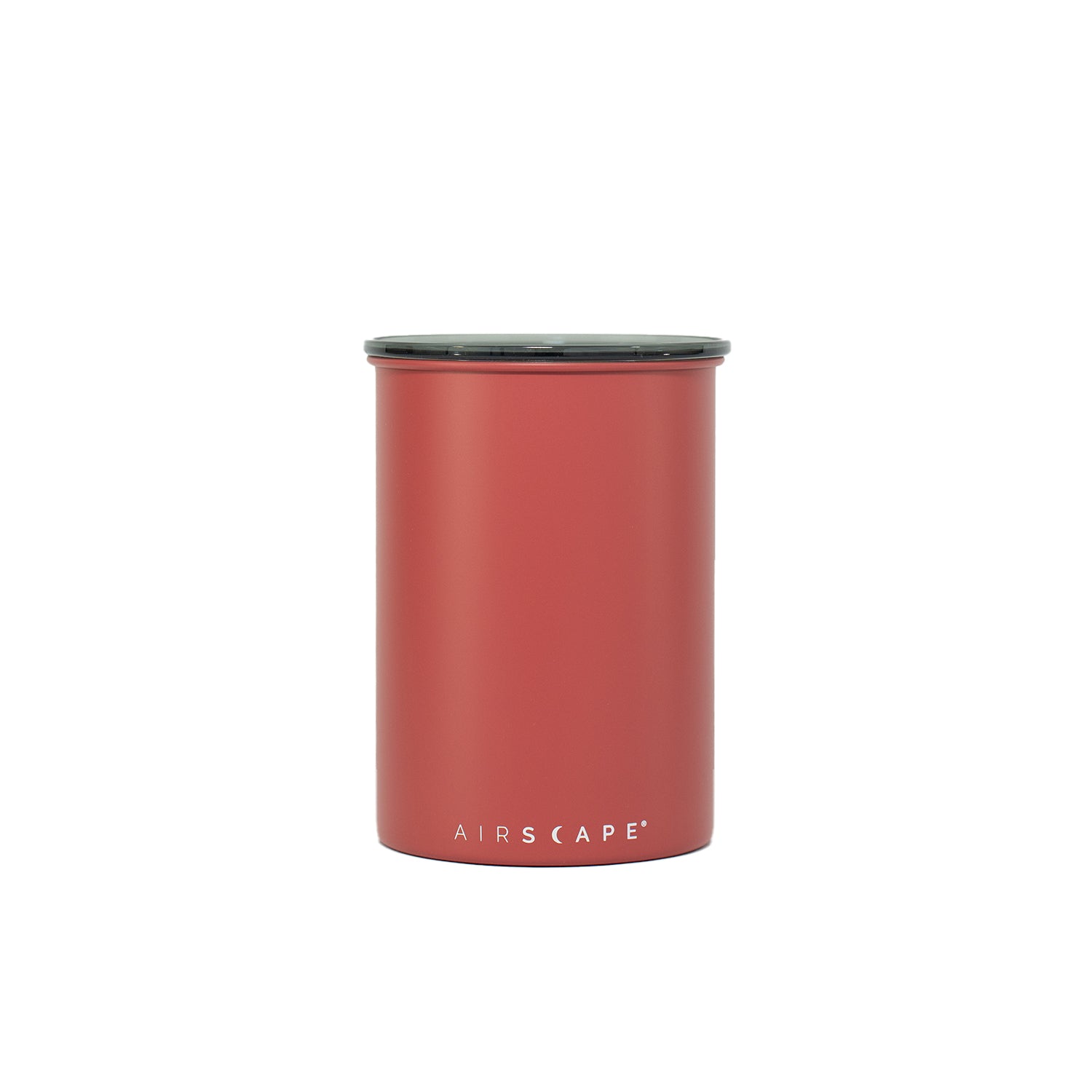Red cylindrical container with black lid on a white background
