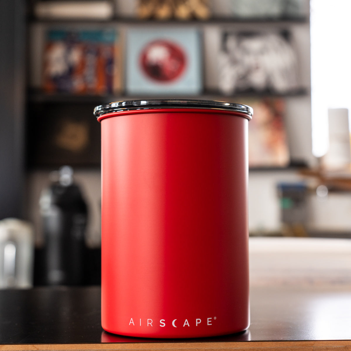 Red airscape container on a kitchen counter with blurred background