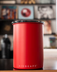 Red airscape container on a kitchen counter with blurred background