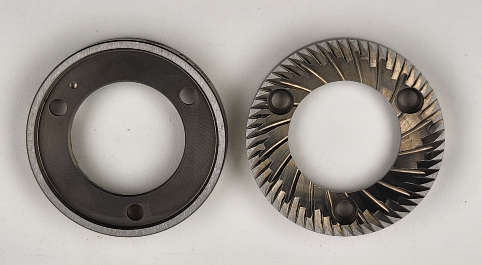Two 58mm stile replacement burrs displayed on a white background