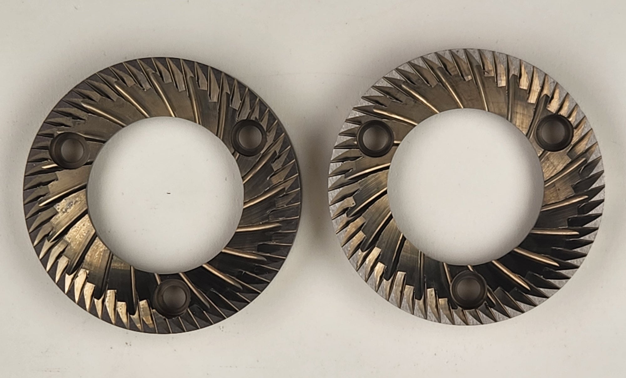 Two 58mm stile replacement burrs displayed on a white background