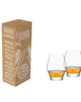 Riedel bourbon glass set with packaging on a white background