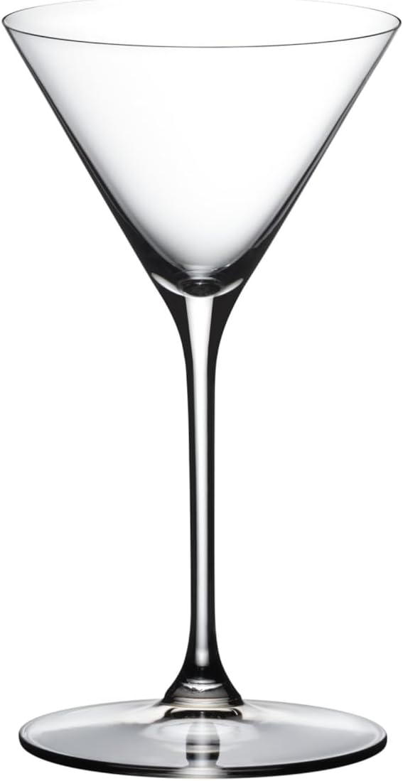 Clear martini glass on a white background