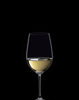 Glass of white wine on a black background
