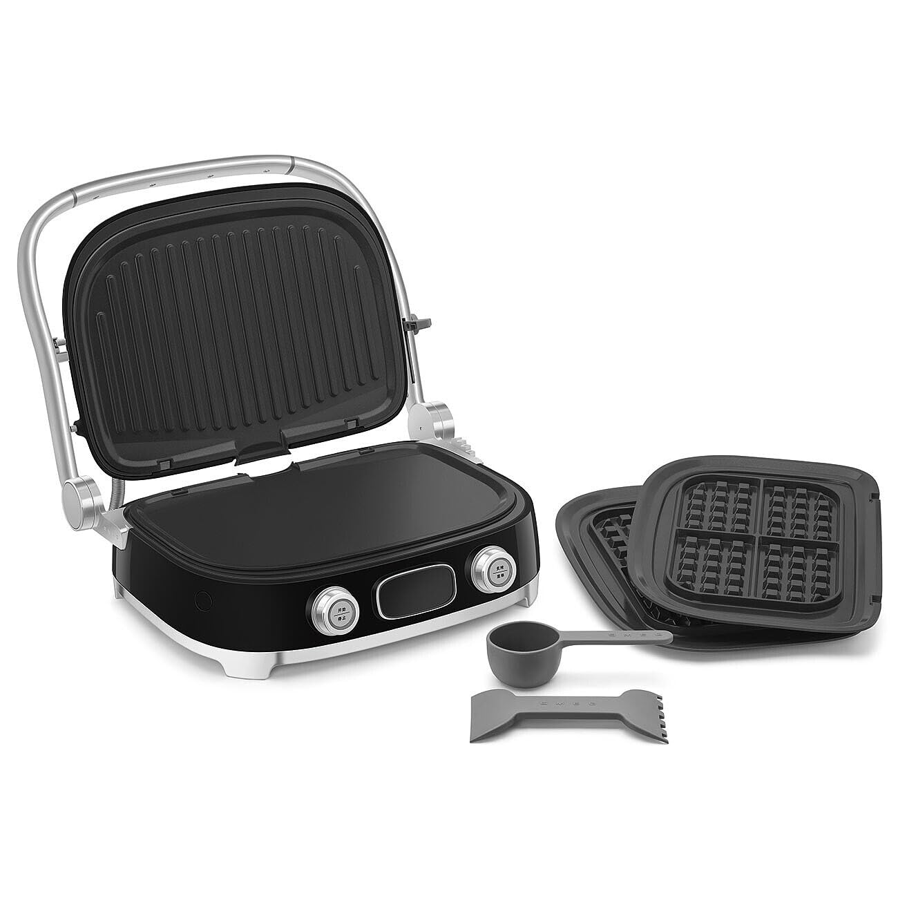 Black and silver grill with an assortment of attachments on a white background