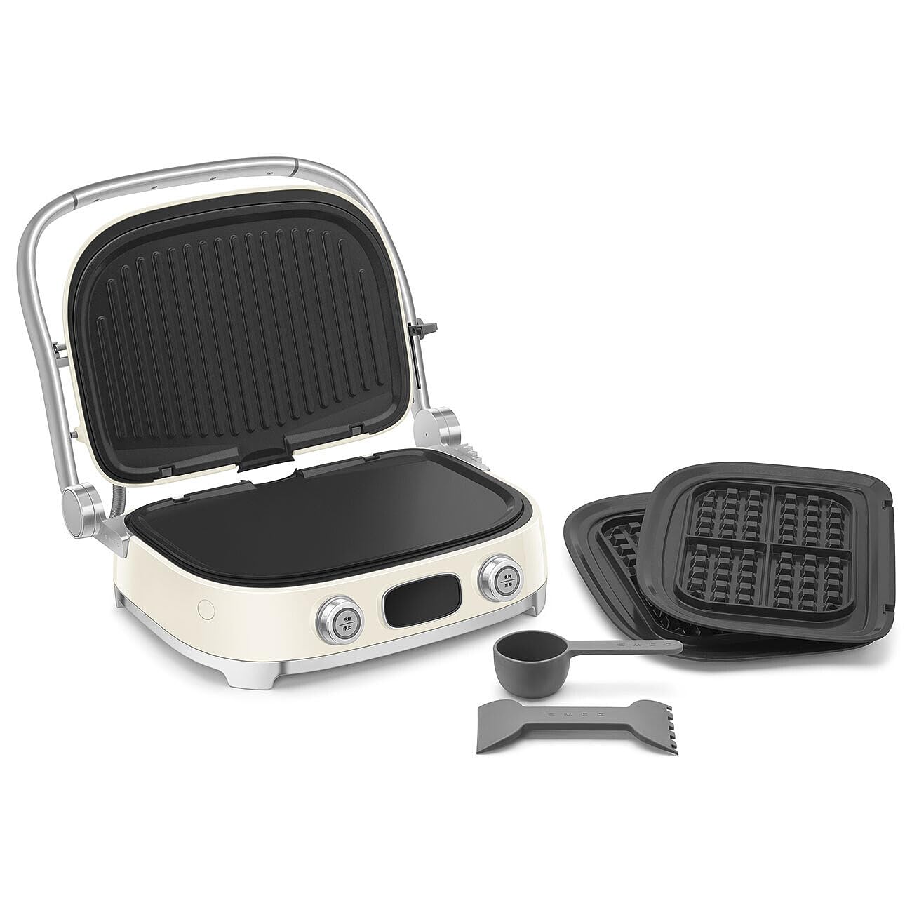 Cream Smeg grill with silver accents with an assortment of attachments on a white background