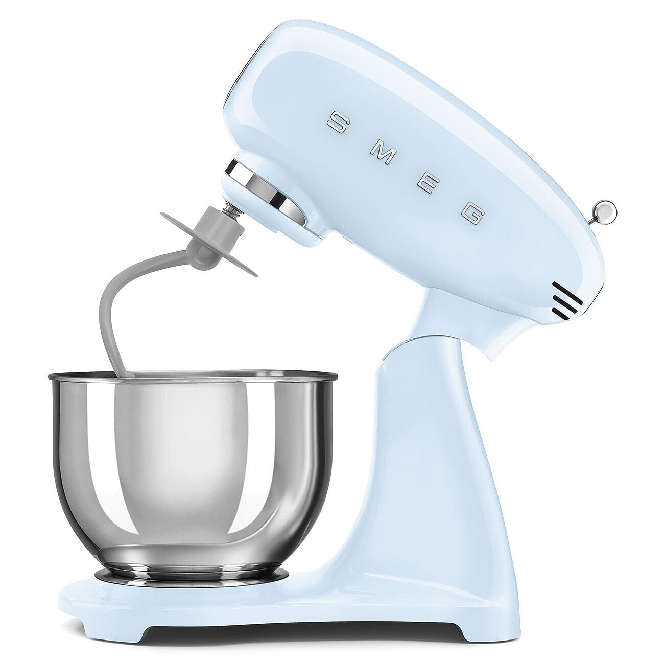 Light blue Smeg stand mixer slanted open with a mixing bowl on a white background