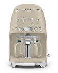 Front view of matte beige Smeg coffee machine on a white background