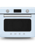 Front view of pastel blue Smeg retro line countertop air fry oven on a white background