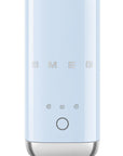 Front view of pastel blue SMEG milk frother displayed on a white background
