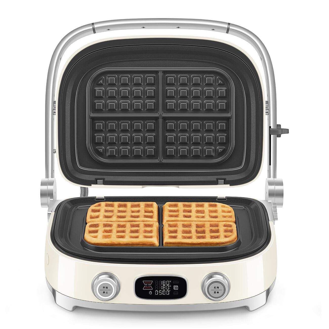 Cream Smeg grill with silver accents with cooked waffles on a white background
