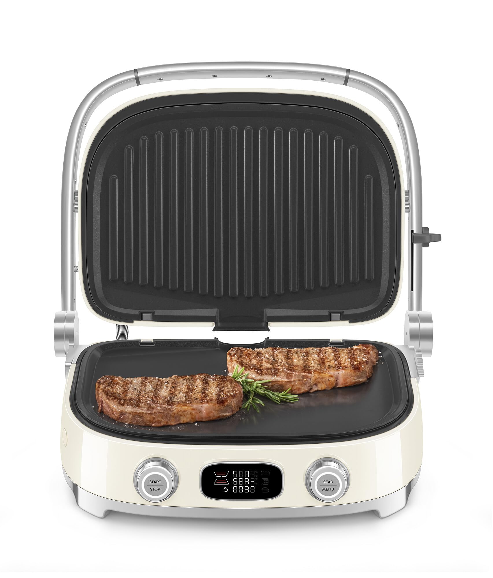 Cream Smeg grill with two steaks on a white background