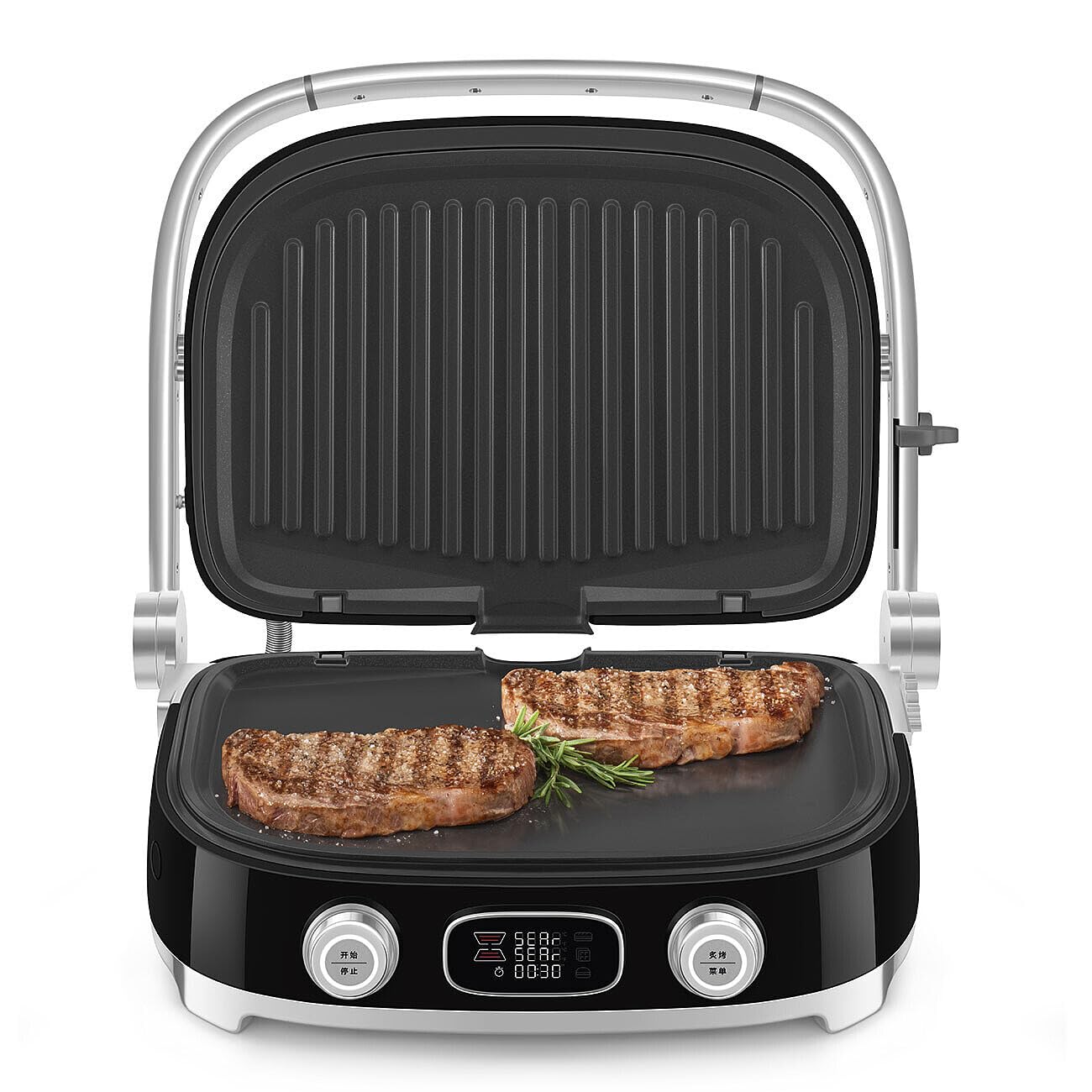 Black Smeg grill with two steaks on a white background