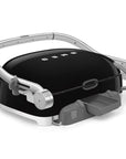 Back view of black Smeg grill with silver accents on a white background