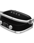 Black Smeg grill with silver accents on a white background