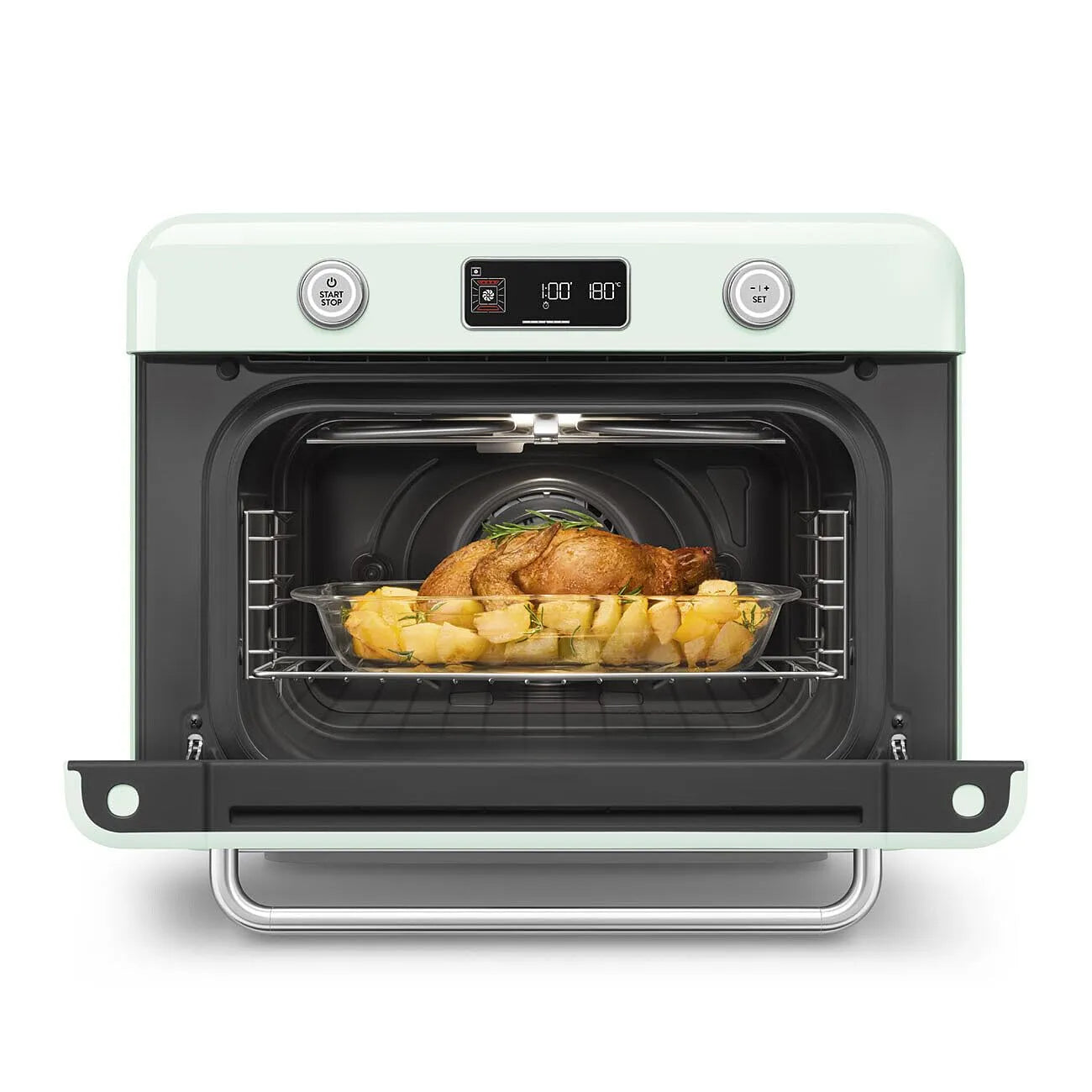 Pastel green Smeg retro line countertop air fry oven with door open with food on a clear container on a white background