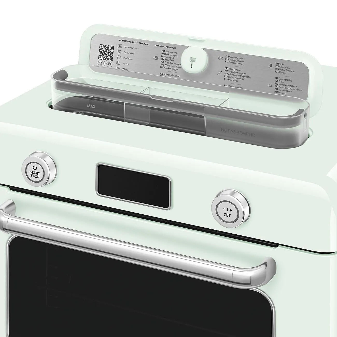 Pastel green Smeg retro line countertop air fry oven with digital panel with 2 switch knobs and lid open on a white background