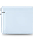 Side view pastel blue Smeg retro line countertop air fry oven on a white background