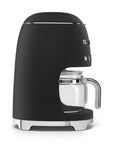 Side view of matte black Smeg coffee machine on a white background