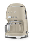 Matte beige Smeg coffee machine on a white background