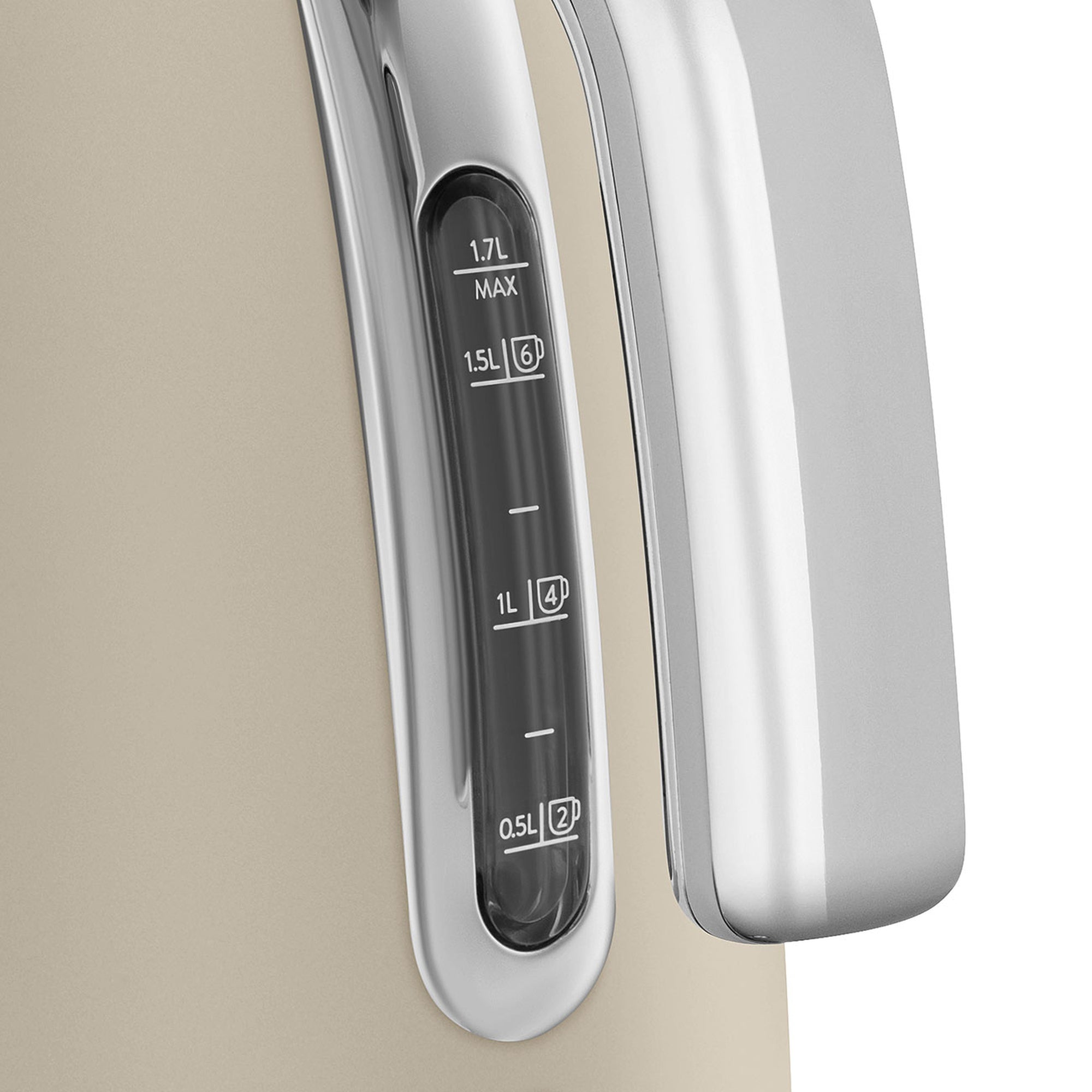 Close up of liter measurement and handle of matte beige kettle displayed on a white background