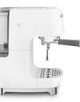 Side view of white SMEG espresso machine on a white background