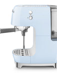 Side view of pastel blue SMEG espresso machine on a white background