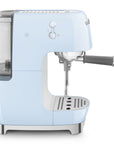 Side view of pastel blue SMEG espresso machine on a white background