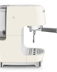 Side view of Cream-colored espresso machine with Smeg logo on a white background