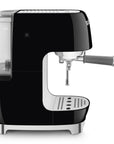 Side view of black SMEG espresso machine on a white background