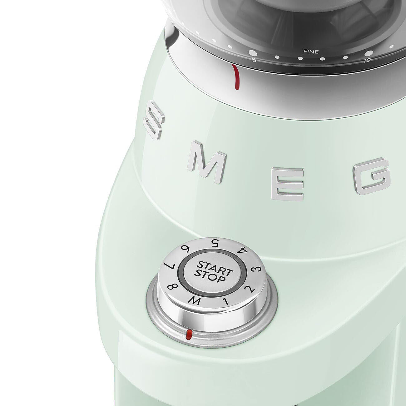 Close-up of a light green coffee grinder with 'Smeg' branding and dial on a white background