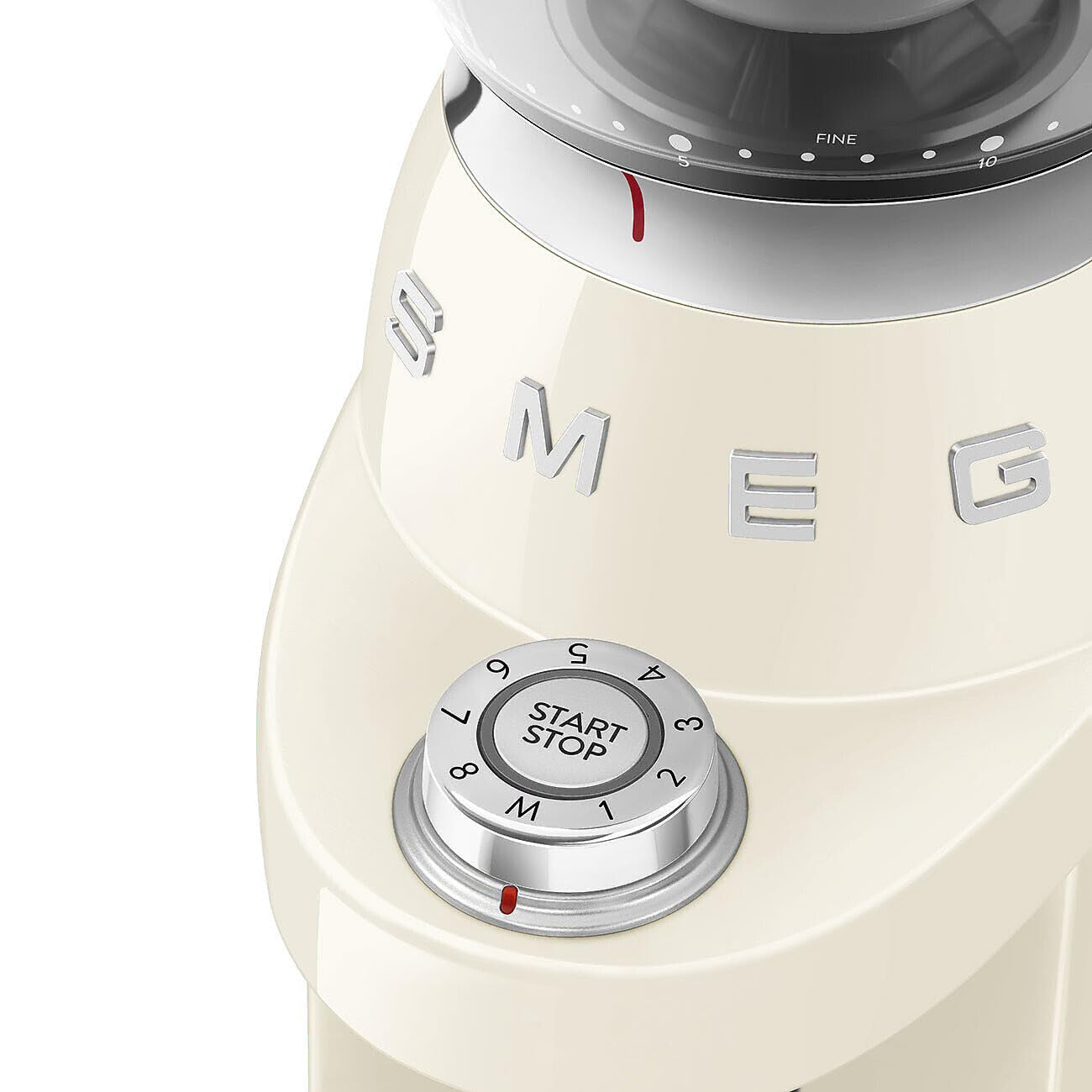 Close-up of a vintage-style coffee grinder with a prominent 'Smeg' brand logo with dial