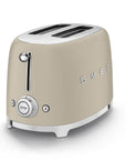 Matte beige toaster with 'Smeg' branding on a white background