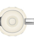 Top view of Smeg cream-colored kettle with metallic accents on a white background