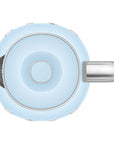 Top view of light blue Smeg electric kettle with metallic handle on a white background