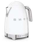 White Smeg electric kettle with silver accents on a white background
