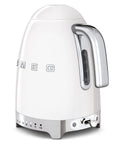 White Smeg electric kettle with metallic accents on a white background