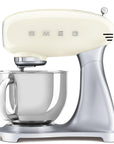 Cream-colored Smeg stand mixer on a white background