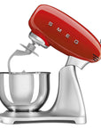 Side view of red SMEG 50s Retro Line Full Color Stand Mixer 5 qt with a tilt displayed on a white background