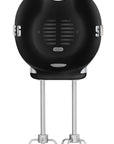 Black hand mixer with attachment on a white background