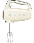 Front view of Cream-colored hand mixer with chrome accents on a white background, featuring the SMEG logo.