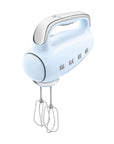 Pastel blue Smeg hand mixer displayed on a white background
